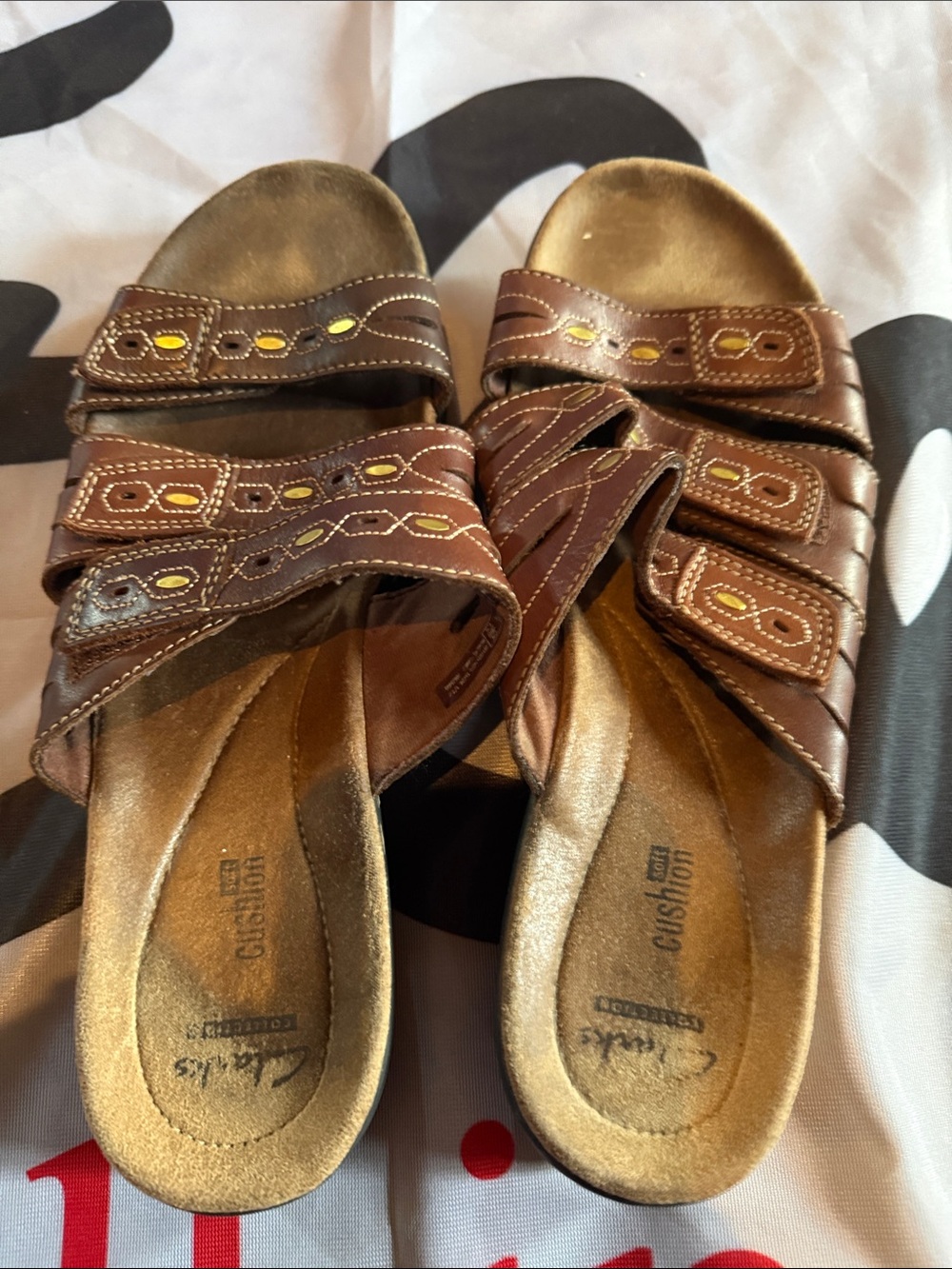 Clarks Brown Leather Slide Mules with Gold Accents